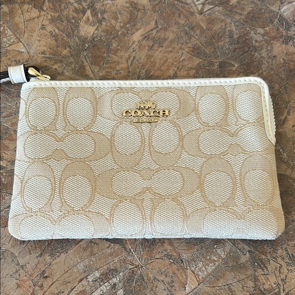 Coach Handbags - Coach Beige Monogram Wristlet